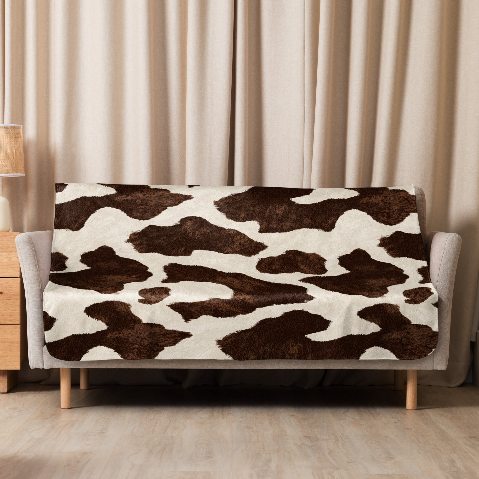 Cosy cow print sherpa throw blanket