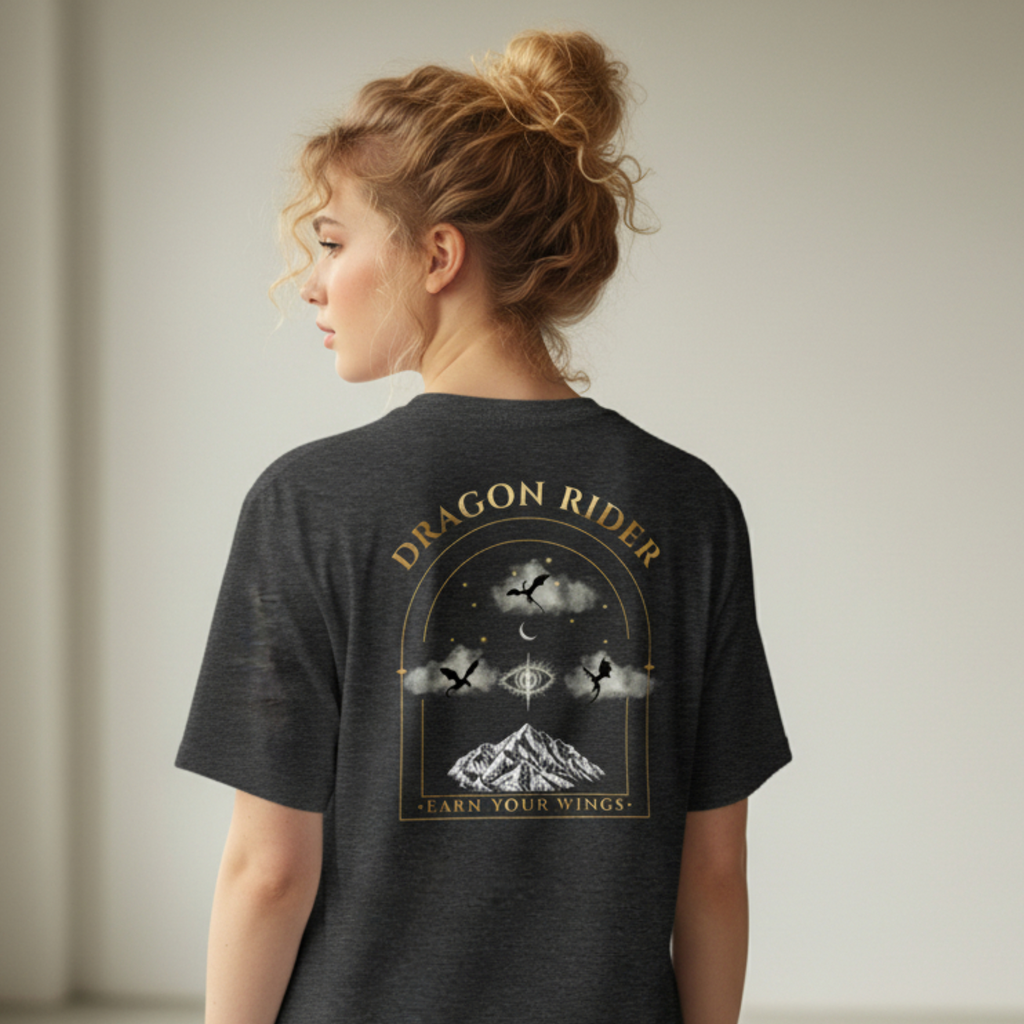 Woman wearing a black t-shirt with 'Dragon Rider' design in a minimalistic room.