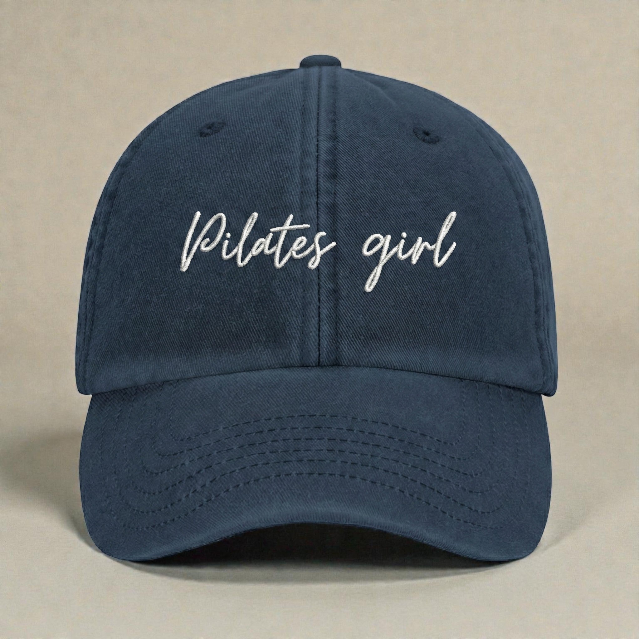 Pilates Girl embroidered dark denim dad cap with white script embroidery on vintage washed cotton baseball cap.