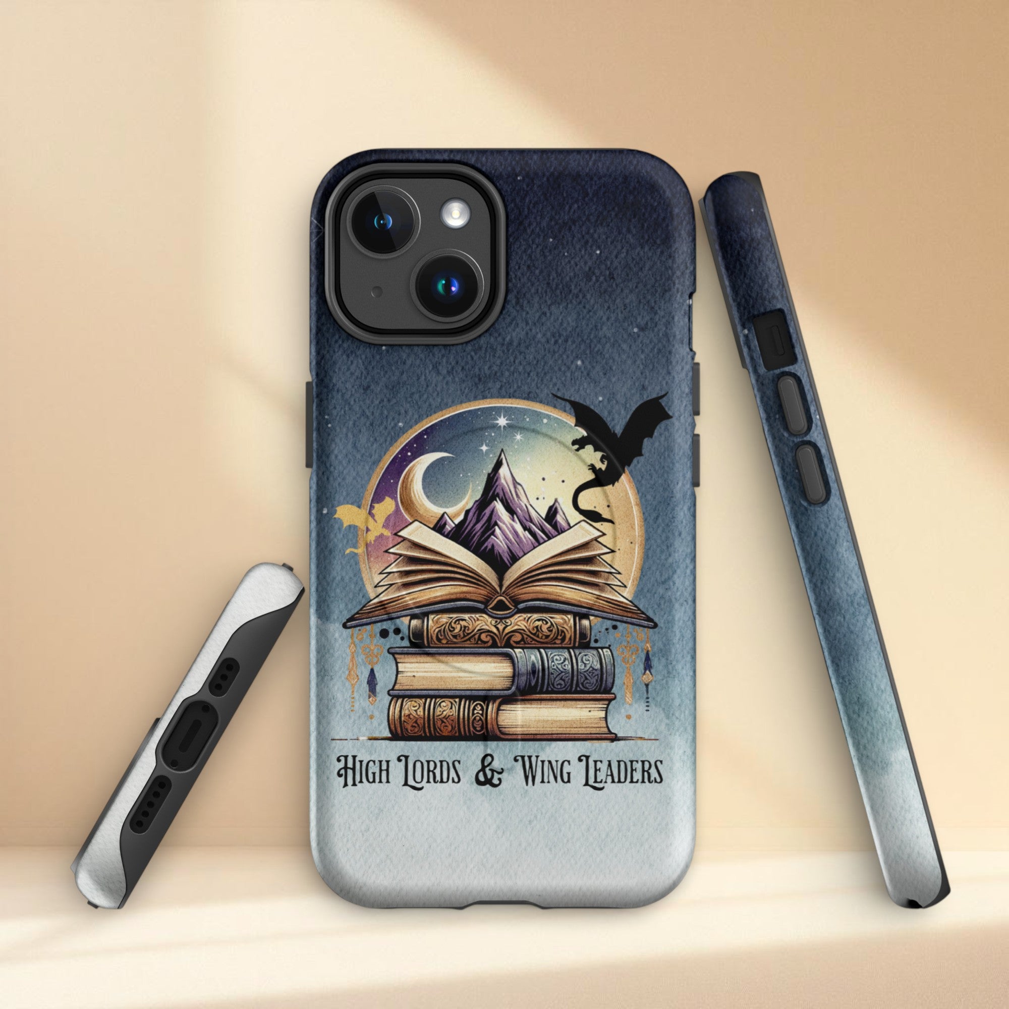 Fantasy book stack dragon iPhone case with open book, mountain, moon and dragon silhouette design on dark blue background, bookish romantasy aesthetic phone case.