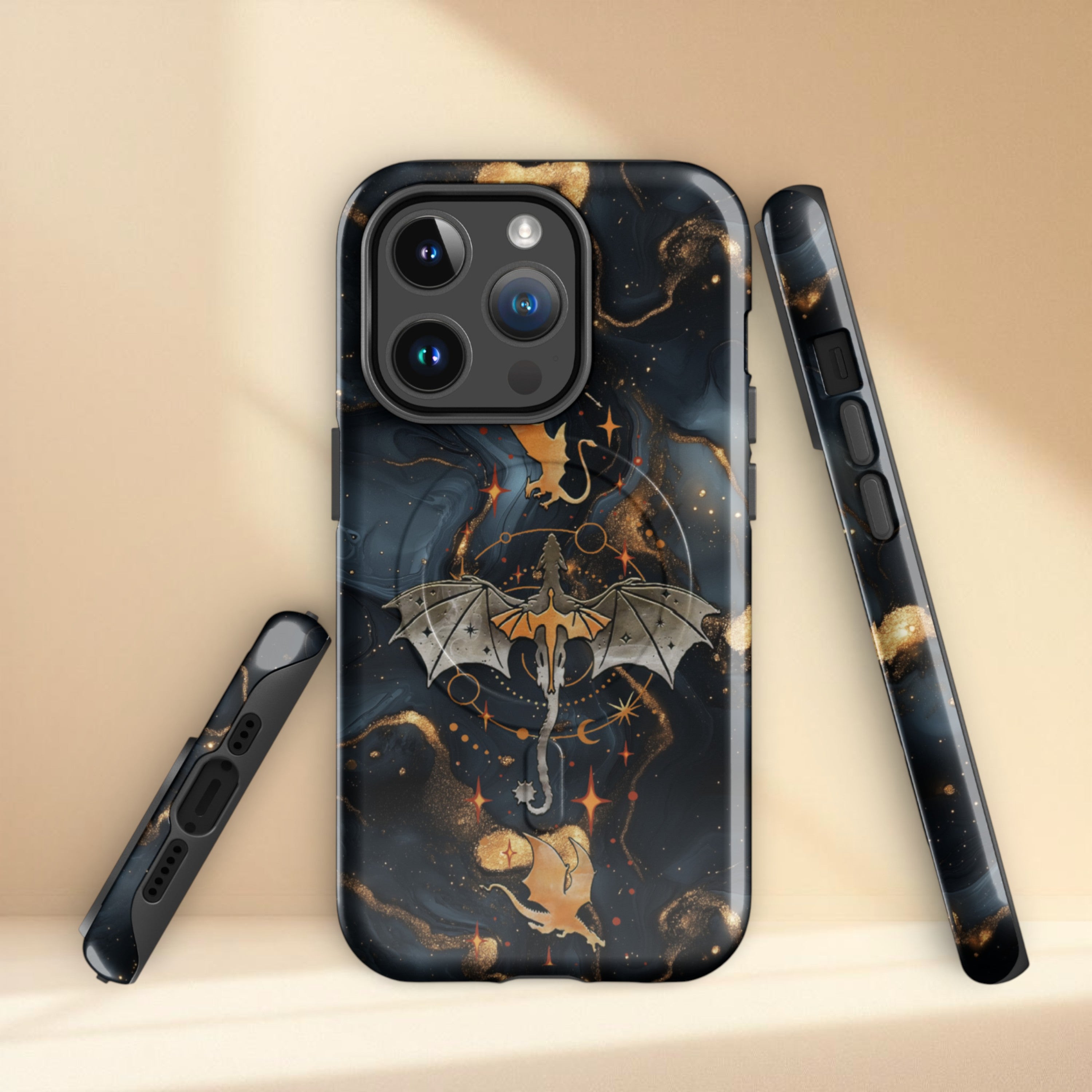 Romantasy dragon aesthetic protective iPhone case with gold dragon illustration and cosmic star detailing, tough dual layer MagSafe phone case.