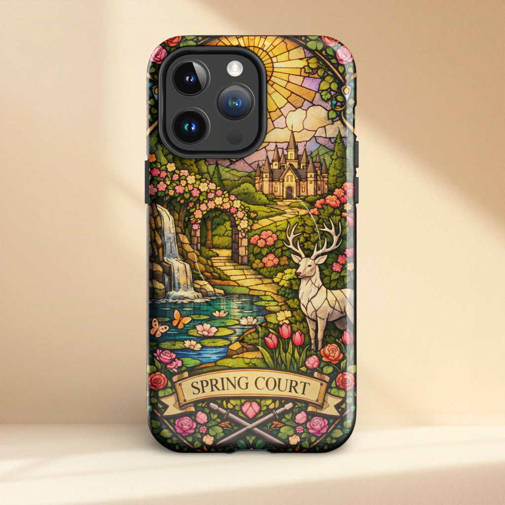 Phone case with a fantasy design featuring a castle, deer, and floral elements on a beige background.